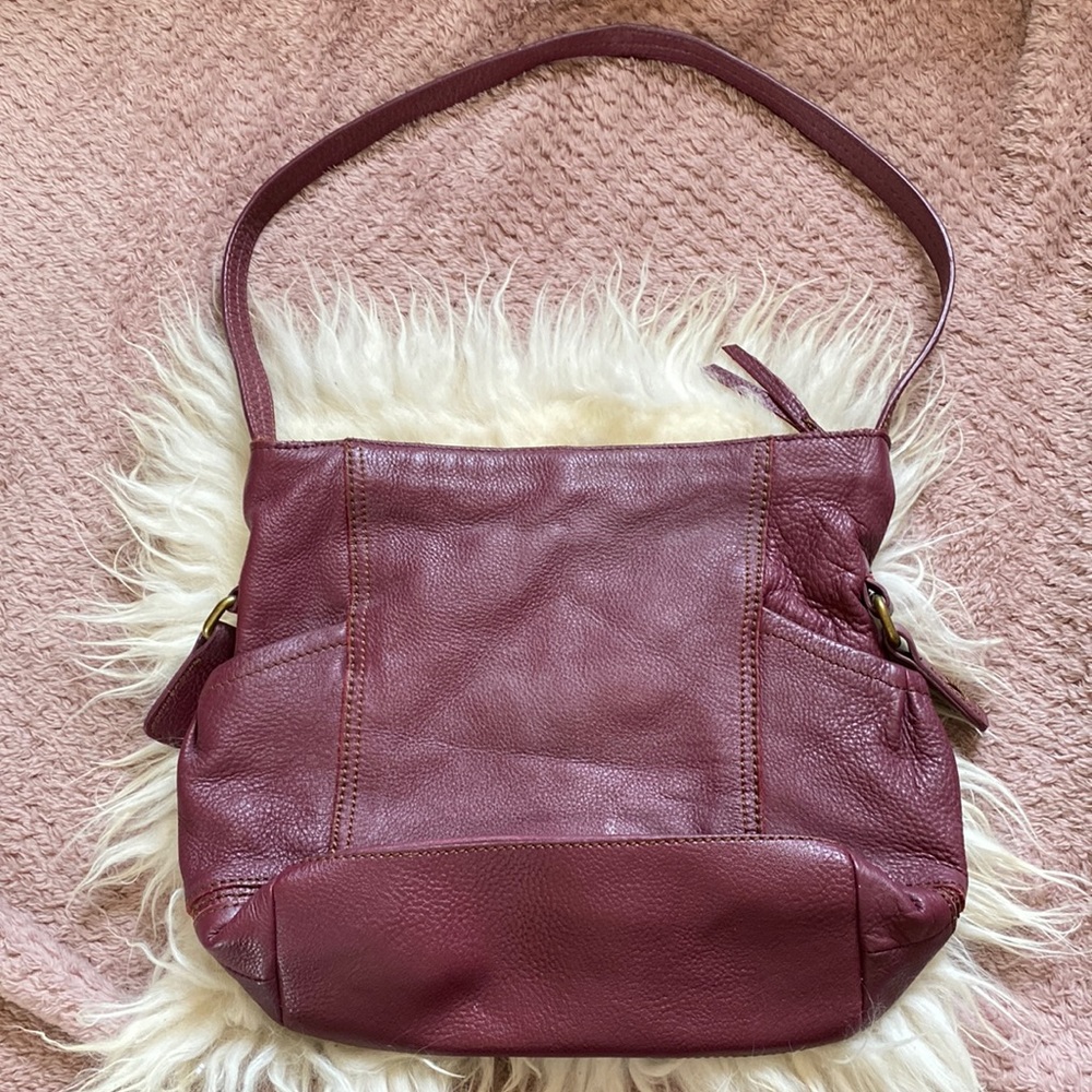 The Sak maroon / purple leather purse